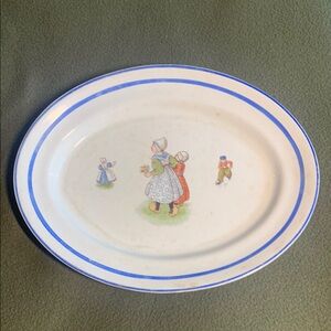 Vintage Naomi China platter with Dutch children. Approximately 12 3/4”.